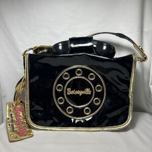 Betseyville Black and Gold Print Call Me Phone Purse